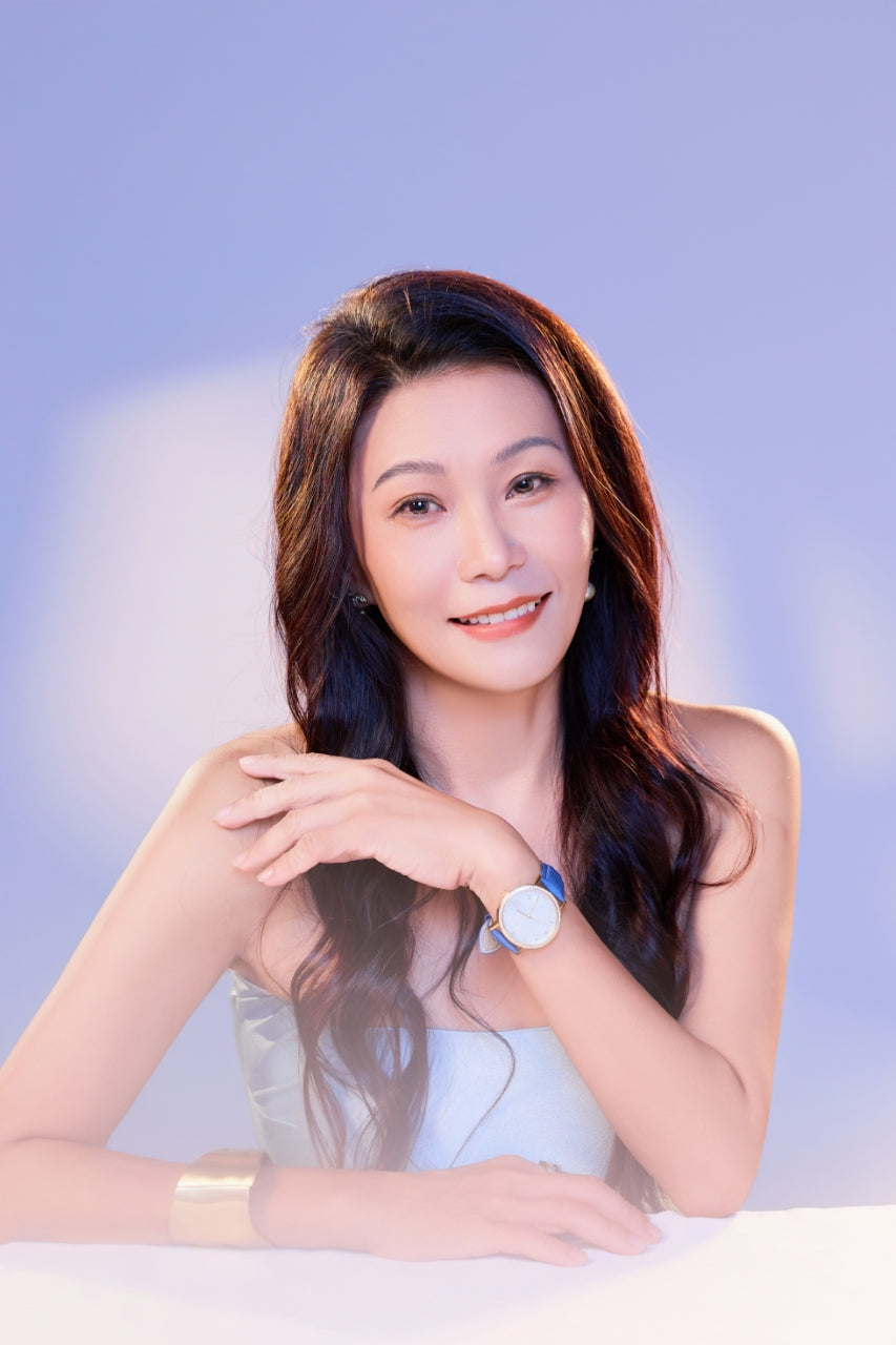 Andrina Chan, founder and Global Brand Ambassador of Andrina Yvette, wearing a mother of pearl timepiece